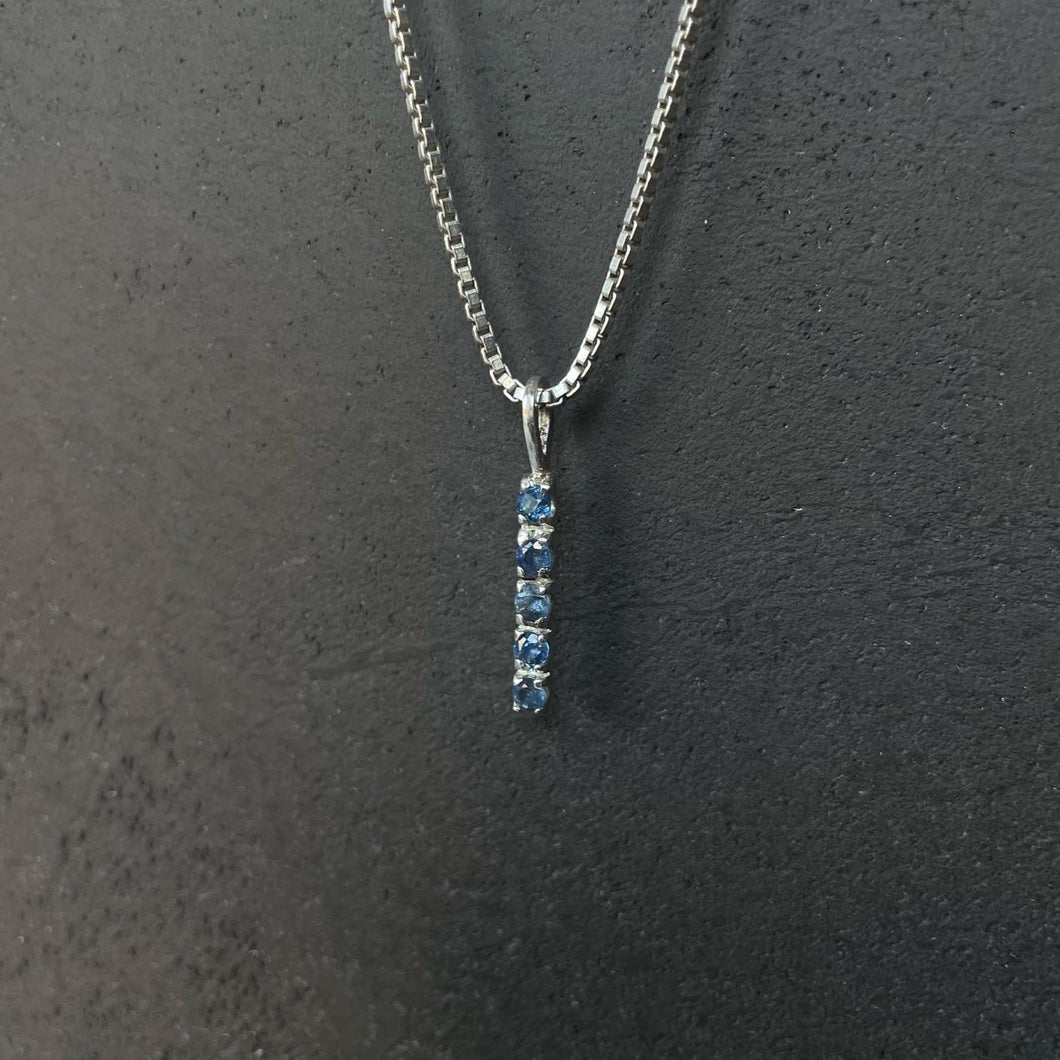 Light blue sapphire 5 stone pendant